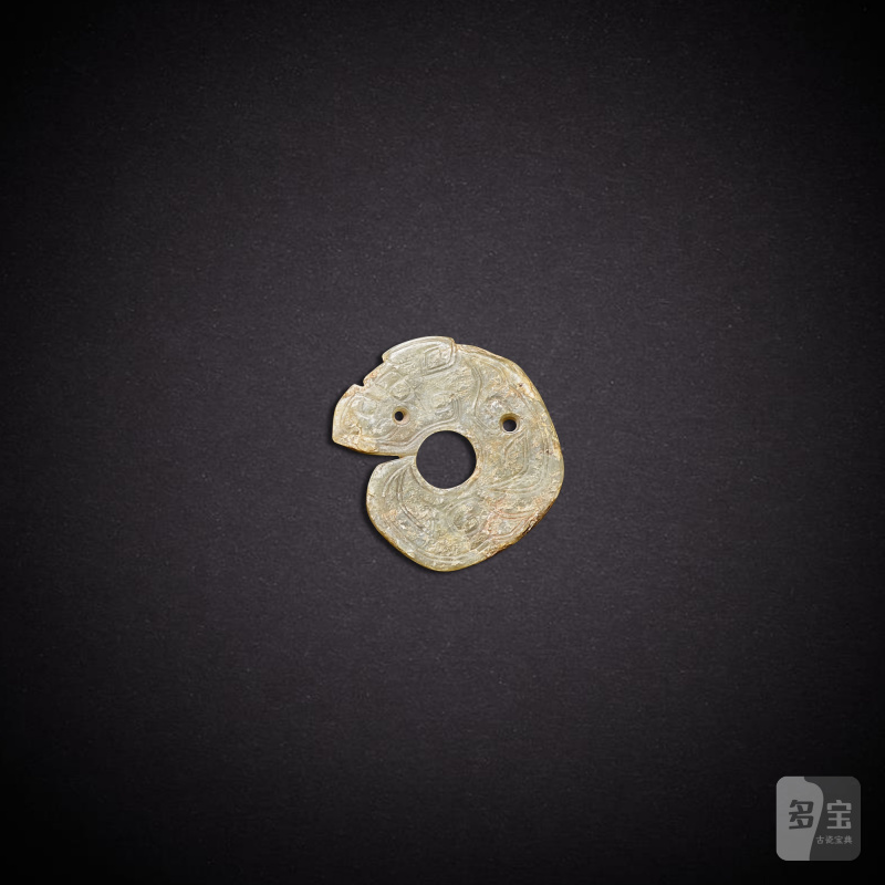 A pale celadon jade 'tiger' pendant, Shang dynasty | 商 青白玉虎紋珮